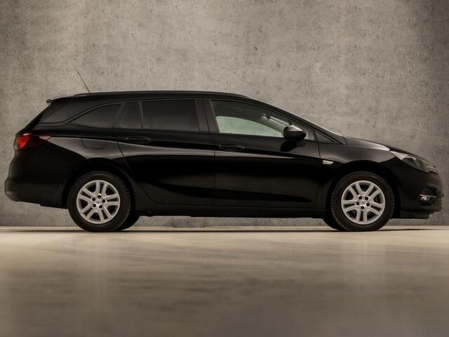 Opel ASTRA Sports Tourer 1.4 Business Sport 146Pk Automaat (APPLE CARPLAY, NAVIGATIE, CRUISE, GETINT GLAS, SPORTSTOELEN, PARKEERSENSOREN, NIEUWE APK, DAB+, NIEUWSTAAT)