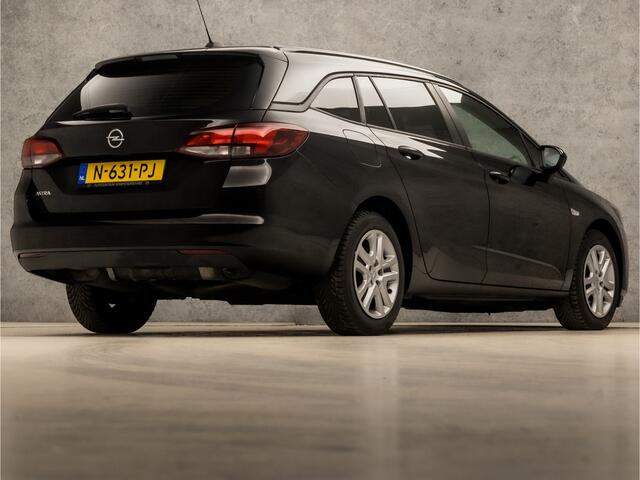 Opel ASTRA Sports Tourer 1.4 Business Sport 146Pk Automaat (APPLE CARPLAY, NAVIGATIE, CRUISE, GETINT GLAS, SPORTSTOELEN, PARKEERSENSOREN, NIEUWE APK, DAB+, NIEUWSTAAT)