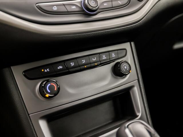 Opel ASTRA Sports Tourer 1.4 Business Sport 146Pk Automaat (APPLE CARPLAY, NAVIGATIE, CRUISE, GETINT GLAS, SPORTSTOELEN, PARKEERSENSOREN, NIEUWE APK, DAB+, NIEUWSTAAT)