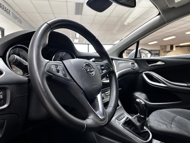 Opel ASTRA Sports Tourer 1.0 Turbo 120 Jaar Edition /Apple + Android /DAB+! /Navi /Climat /Cruise /Elek. pakket /Bluetooth /Regensensor /16"LMV /Extra getint glas /PDC V+A /LED Dagrijverl. /Dakrails.