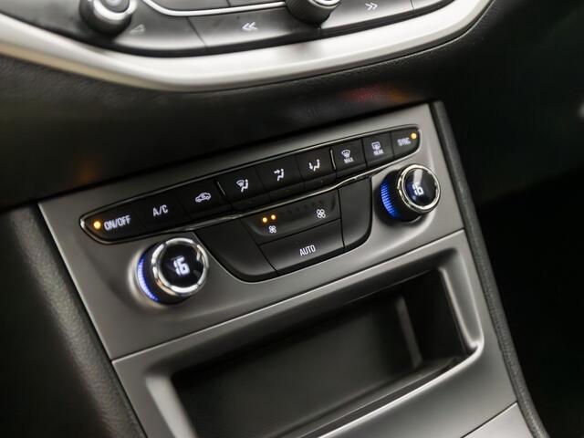 Opel ASTRA Sports Tourer 1.0 Turbo Sport (APPLE CARPLAY, GROOT NAVI, CLIMATE, SPORTSTOELEN, LEDER, PARKEERSENSOREN, GETINT GLAS, LM VELGEN, NIEUWSTAAT)