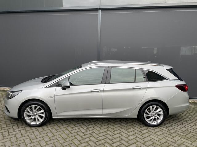 Opel ASTRA Sports Tourer 1.2 Business Elegance Airco - Cruise control - Parkeersensoren voor en achter - Achteruitrijcamera - Navigatie - Bluetooth - Keyless start and entry - Start/stop systeem - Stuur leder - Stuur multifunctioneel