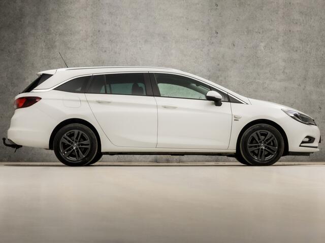 Opel ASTRA Sports Tourer 1.0 Turbo 120 Jaar Edition (APPLE CARPLAY, NAVIGATIE, CLIMATE, LED KOPLAMPEN, SPORTSTOELEN, CRUISE, PARKEERSENSOREN, GETINT GLAS, LM VELGEN, NIEUWSTAAT)