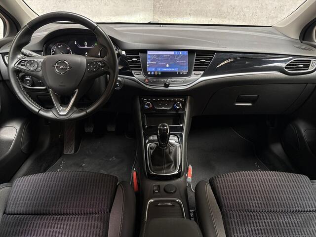 Opel ASTRA 1.2 Elegance (APPLE CARPLAY, GROOT NAVI, CAMERA, LEDER, ADAPTIVE CRUISE, SPORTSTOELEN, KEYLESS, TREKHAAK, LED KOPLAMPEN, NIEUWSTAAT)