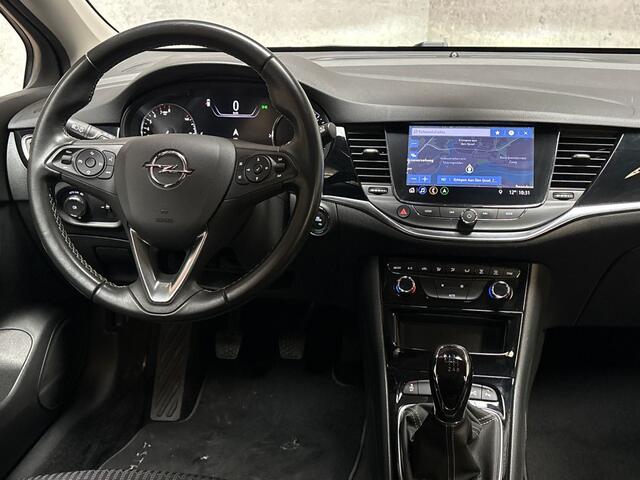 Opel ASTRA 1.2 Elegance (APPLE CARPLAY, GROOT NAVI, CAMERA, LEDER, ADAPTIVE CRUISE, SPORTSTOELEN, KEYLESS, TREKHAAK, LED KOPLAMPEN, NIEUWSTAAT)