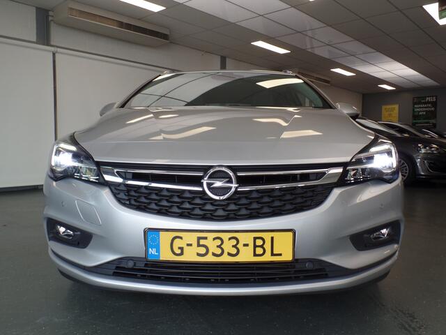 Opel ASTRA Sports Tourer 1.0 Turbo Innovation Navigatie, Achteruitrijcamera, Elek achterklep, Clima controle, Cruise controle, Elek ramen/Spiegels, Deels leder, Xenon, Pdc V/A, Lm velgen 16'', Nederlandse auto!! Bovag afleverpakket 695,-