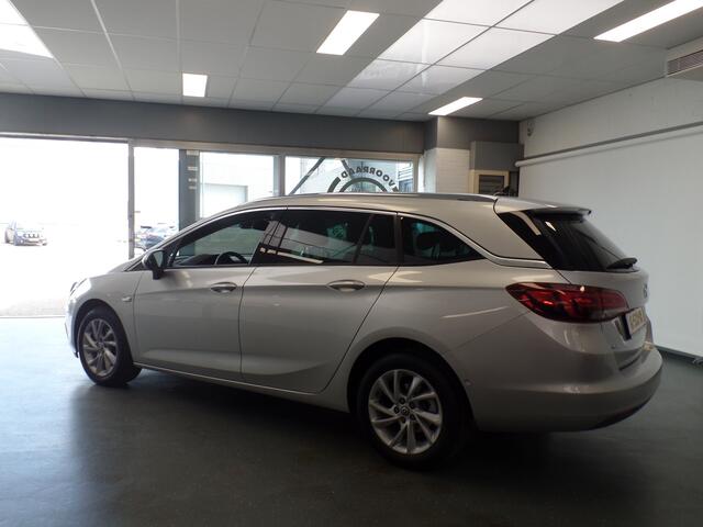 Opel ASTRA Sports Tourer 1.0 Turbo Innovation Navigatie, Achteruitrijcamera, Elek achterklep, Clima controle, Cruise controle, Elek ramen/Spiegels, Deels leder, Xenon, Pdc V/A, Lm velgen 16'', Nederlandse auto!! Bovag afleverpakket 695,-