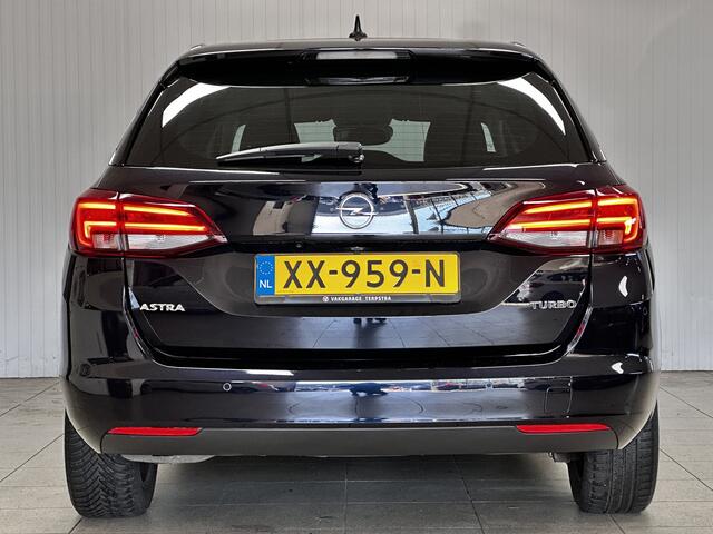 Opel ASTRA Sports Tourer 1.4 Innovation/ Matrix LED!/ Elek.Klep/ 16''LMV/ Grootlichtass./ Dodehoekdetc./ Camera/ Keyless/ DAB+/ Apple+Android/ CLima/ Navi/ Cruise/ Bluetooth/ Multi.LEDER.Stuur/ Elek.Pakket/ Isofix/ PDC V+A.