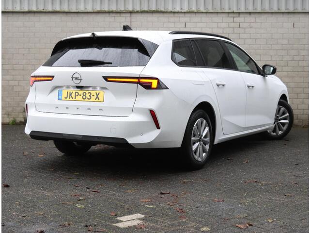 Opel ASTRA Sports Tourer 1.2 110PK Turbo Business Edition | 1ste eigenaar | AppleCarPlay/AndroidAuto | Navigatie | Adaptive Cruise Control | Keyless | AGR Stoelen | Stoel/StuurVerwarming | FULL LED | Camera | Isofix | Privacy Glass |