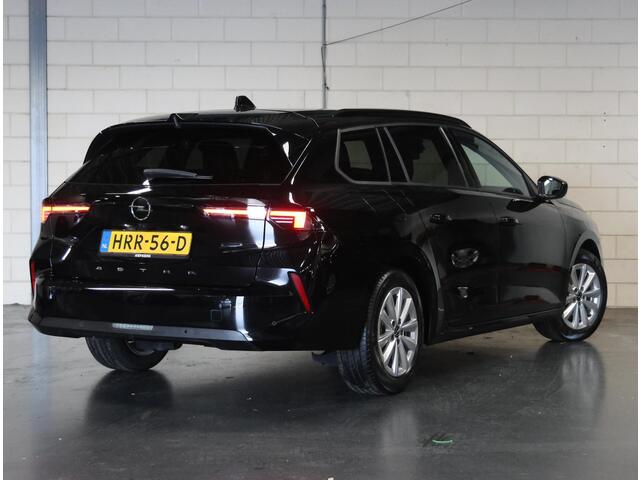 Opel ASTRA Sports Tourer 1.2 110PK Business Edition | 1ste eigenaar | Navigatie | Climate Control | Adaptieve Cruise Control | Achteruitrijcamera | Parkeersensoren | Stoel/Stuurverwarmd | Keyless | AppleCarplay/AndroidAuto | Isofix | Privacy Glass |