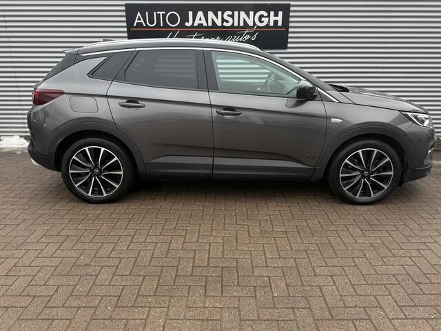 Opel Grandland X 1.6 Hybrid 225pk Automaat | Vol lederen bekleding | Stoelverwarming/Ventilatie | Clima | Cruise | LM Velgen | Privacy glas | RIJKLAARPRIJS INCL 12 MAANDEN GARANTIE EN BEURT