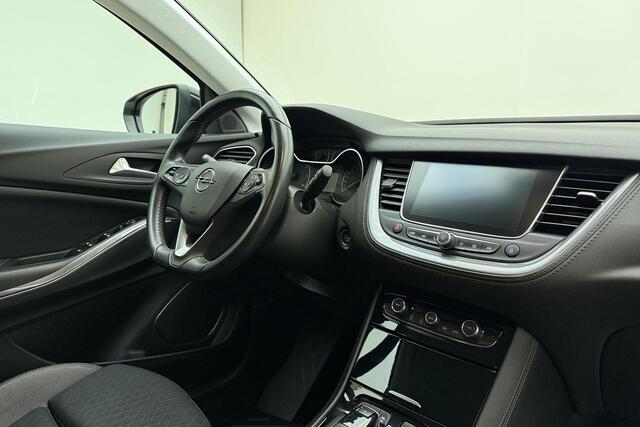 Opel Grandland X 1.6 Turbo 300pk Hybrid4 Elegance | Navigatie | Keyless | Camera | Parelmoer kleur | Electrische achterklep | Lichtmetalen velgen | AGR Comfortstoelen | Voorruitverwarming | Zwart dak
