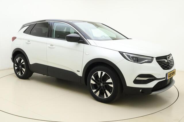 Opel Grandland X 1.6 Turbo 300pk Hybrid4 Elegance | Navigatie | Keyless | Camera | Parelmoer kleur | Electrische achterklep | Lichtmetalen velgen | AGR Comfortstoelen | Voorruitverwarming | Zwart dak