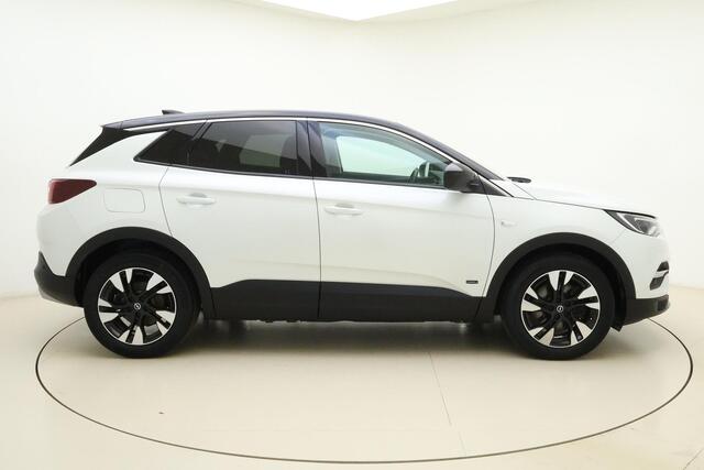 Opel Grandland X 1.6 Turbo 300pk Hybrid4 Elegance | Navigatie | Keyless | Camera | Parelmoer kleur | Electrische achterklep | Lichtmetalen velgen | AGR Comfortstoelen | Voorruitverwarming | Zwart dak