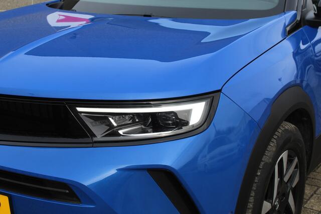 Opel MOKKA 1.2 Turbo Edition Virtueelcockpit XXL/Navigatie/Achteruitrijcamera/Apple carplay/Adaptive cruisecontrol/Stoelverwarming/Stuurverwarming/Parkeersensoren rondom/Led dagrijverlichting/Keyless/Privacyglas