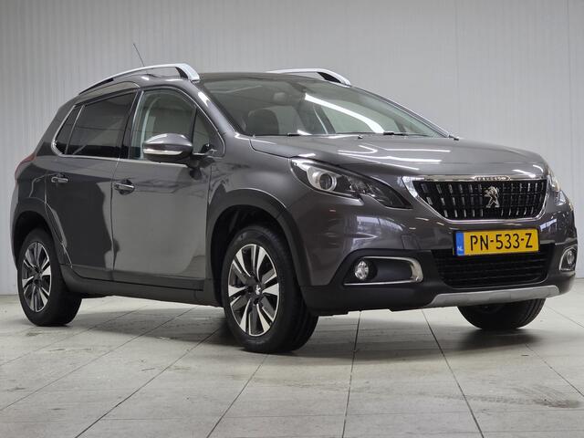 Peugeot 2008 1.2 PureTech Allure/ D-Riem verv: 64.000 KM!/ AUTOMAAT!/ Trekhaak/ Half-Leder/ Panorama-Dak/ Apple + Android/ DAB+/ Navi/ Clima/ Cruise/ Bluetooth/ Multi. LEDER. Stuur/ 16'' LMV/ Mistl./ PDC/ Extra getint Glas/ D
