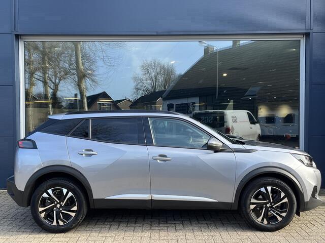 Peugeot 2008 1.2 Turbo 130 PK Allure Pack | 1e Eigenaarsauto met slechts 35.500 KM | Hoge Zitpositie | Navigatie | Climate Control | Keyless Entry | Draadloze Telefoonlader | Digitaal Dashboard | Camera | Parkeersensoren V+A | LED Verlichting | 17" Lichtmetalen Velgen