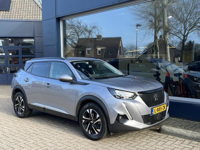 Peugeot 2008 1.2 Turbo 130 PK Allure Pack | 1e Eigenaarsauto met slechts 35.500 KM | Hoge Zitpositie | Navigatie | Climate Control | Keyless Entry | Draadloze Telefoonlader | Digitaal Dashboard | Camera | Parkeersensoren V+A | LED Verlichting | 17" Lichtmetalen Velgen