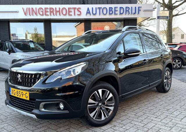 Peugeot 2008 Benzine 130 Pk * Allure * Navigatie * 1/2 Lederen Interieur * Climate & Cruise Control * L.M. Velgen * DAB Radio * Achteruitrij Camera & Parkeersensoren * Vingerhoets; Vierde Generatie Eersteklas Service. Al meer dan 100 jaar een begrip in de Brabantse Ke