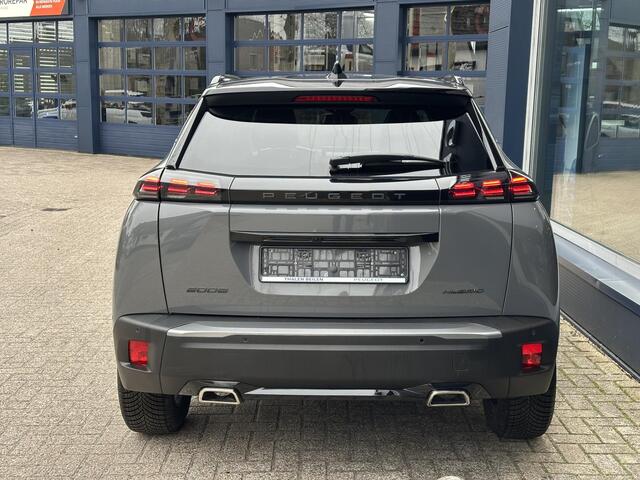 Peugeot 2008 1.2 Hybrid 145 PK GT | Meest Complete Uitvoering | Slechts 16.880 KM | Navigatie | 360 Graden Camera | Adaptieve Cruise Control | All Season Banden | Grip Control | Climate Control | Full LED Verlichting | Zwart Dak | Hoge Zitpositie | 17" Lichtmetalen Ve