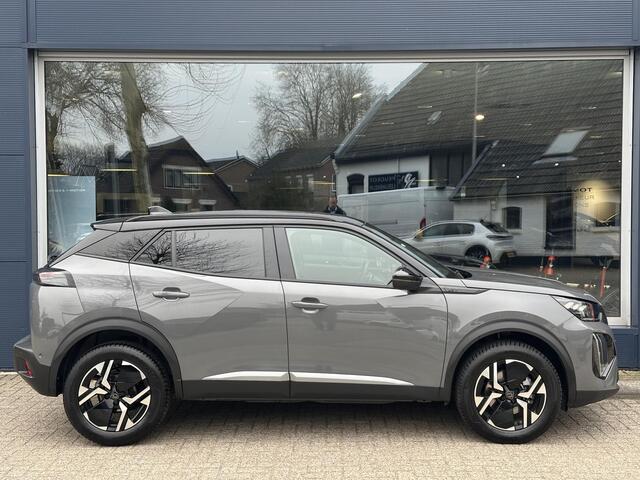 Peugeot 2008 1.2 Hybrid 145 PK GT | Meest Complete Uitvoering | Slechts 16.880 KM | Navigatie | 360 Graden Camera | Adaptieve Cruise Control | All Season Banden | Grip Control | Climate Control | Full LED Verlichting | Zwart Dak | Hoge Zitpositie | 17" Lichtmetalen Ve