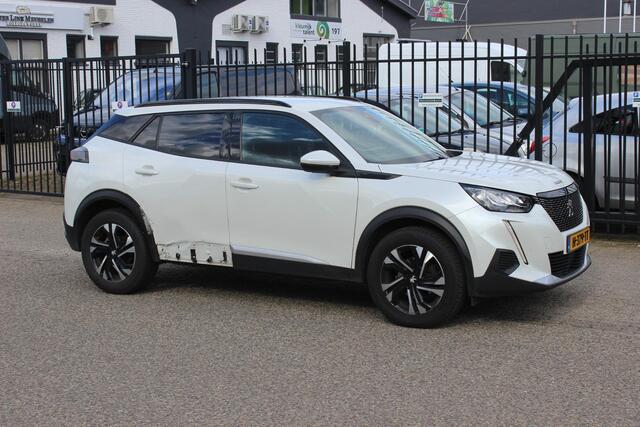 Peugeot 2008 1.2 PureTech Allure, Lesauto met dubbele bediening