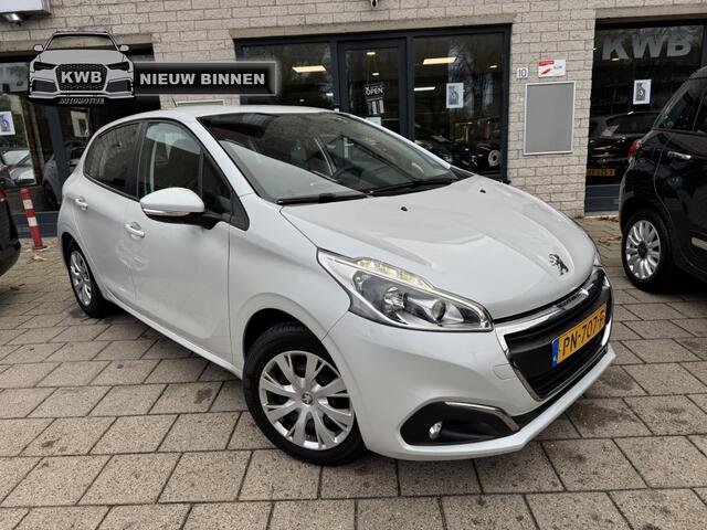 Peugeot 208 1.2 PureT. Parelmoer wit Navi Distri VV