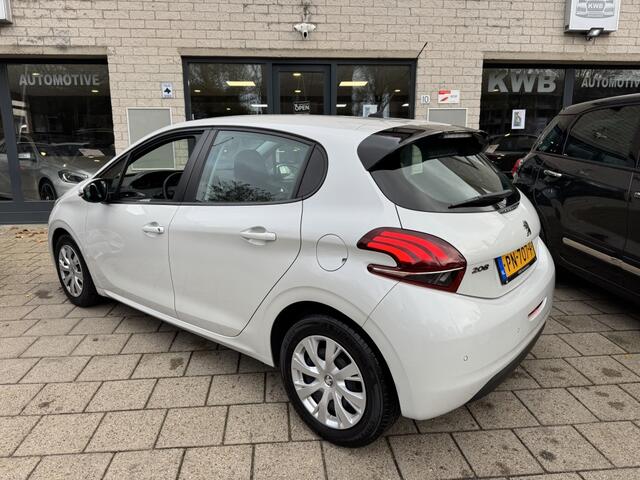 Peugeot 208 1.2 PureT. Parelmoer wit Navi Distri VV