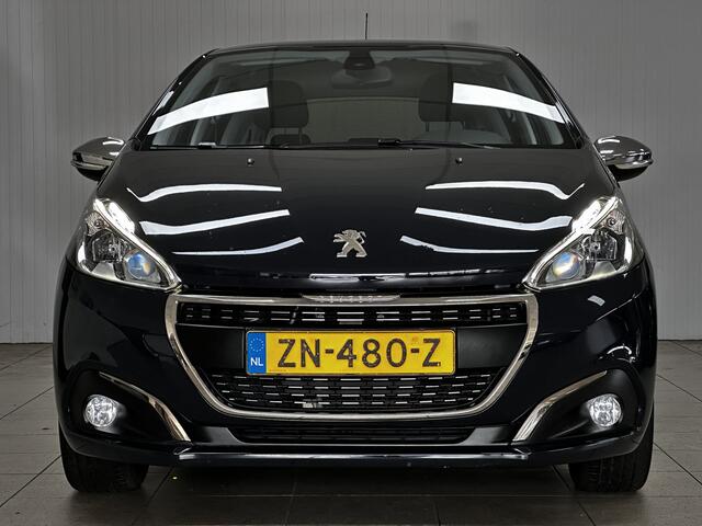 Peugeot 208 1.2 PureTech Signature/ D-Riem verv: 56.000 KM!/ Apple + Android/ DAB+/ Dakspoiler/ Navi/ Extra getint glas/ Airco/ Cruise/ Elek. pakket/ Isofix/ Bluetooth/ Armsteun/ Multi. LEDER. Stuur/ Mistl./ PDC/ LED Dagrijverl