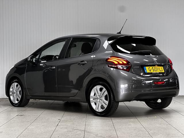 Peugeot 208 1.2 PureTech Signature/ Airco!/ Navi/ Bluetooth/Multi.LEDER.Stuur/ Elek.Pakket/ Isofix/ PDC achter/ Metallic Lak.