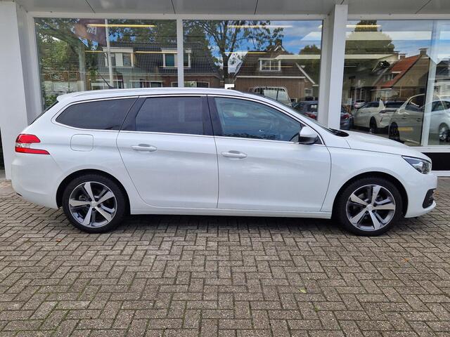 Peugeot 308 SW 1.2 PureTech Blue Lease Premium 110 PK | Vol Leder | Memorie + verwarmde Stoel | PDC V+A | Camera | Navigatie | Panorama Dak | Apple Carplay/Android Auto |