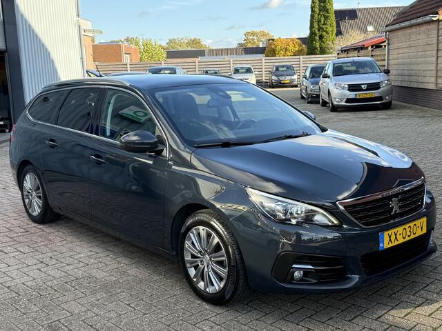 Peugeot 308 SW 1.2 PureTech Blue Lease Premium | TREKHAAK | LEER | CAMERA | NAVI | PANO |