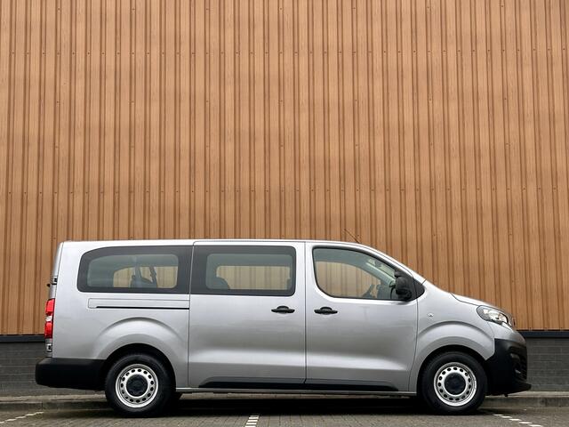 Peugeot EXPERT Traveller 8P 1.5 BlueHDi 120 Business Long S&S | Exportprijs | Cruise Control | Parkeersensoren Achter | Apple Carplay/Android Auto | Airconditioning | Bluetooth | Navigatie |Stop & Go |
