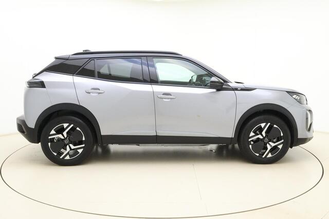Peugeot e-2008 EV GT 54 kWh | Achteruitrijcamera | Parkeersensoren | Adaptive cruise control | Wireless charging | Navigatie | Airco | Climate control | Stuurbediening | Interieurverlichting | Half stof/leer bekleding | Verkeersbord detectie