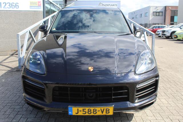 Porsche CAYENNE Coupé 3.0 E-Hybrid Orig.NL auto/Panoramadak/Sportchrono/Adaptive cruise control/Achteruitrijcamera/Parkeersensoren rondom/Elektrisch verstelbare stoelen met memory/Dodehoek detectie/Active suspension management/Stoelverwarming + koeling/21'' Lichtmetalen 
