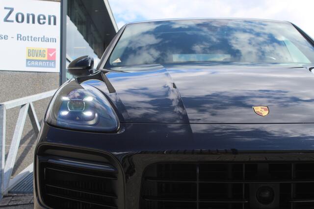 Porsche CAYENNE Coupé 3.0 E-Hybrid Orig.NL auto/Panoramadak/Sportchrono/Adaptive cruise control/Achteruitrijcamera/Parkeersensoren rondom/Elektrisch verstelbare stoelen met memory/Dodehoek detectie/Active suspension management/Stoelverwarming + koeling/21'' Lichtmetalen 