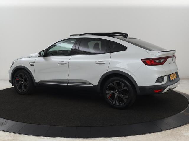 Renault Arkana 1.6 E-Tech Hybrid 145 R.S. Line | Panoramadak | Leder/Alcantara | Trekhaak | Stoelverwarming | Adaptive cruise | Camera | Carplay | Keyless | Park Assist | Full LED | Navigatie | Stuurverwarming