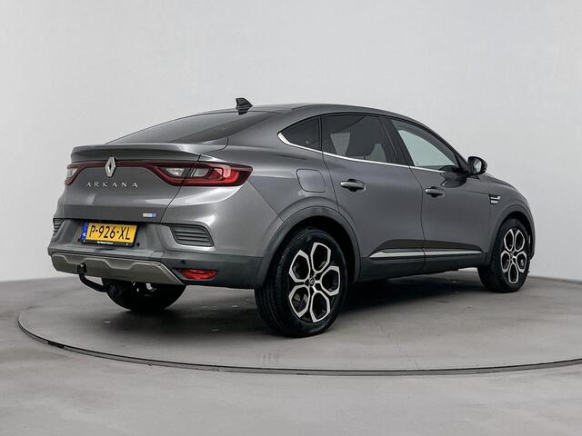 Renault Arkana 1.6 E-Tech Hybrid 145Pk Intens | Navigatie | Apple & Android Carplay | Parkeersensoren Voor & Achter | Achteruitrijcamera | Climate Control | Privacy Glass | Adaptieve Cruise Control & Snelheidsbegrenzer | Trekhaak |