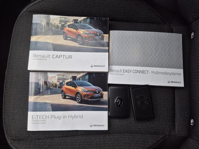 Renault CAPTUR 1.6 E-Tech Plug-in Hybrid 160 Intens Automaat / Accu SOH 91.25% / Apple Carplay Android Auto / Stuur-, en Stoel verwarming / Achteruitrijcamera / Keyless Entry/Start / Draadloze telefoon lader / Cruise control /