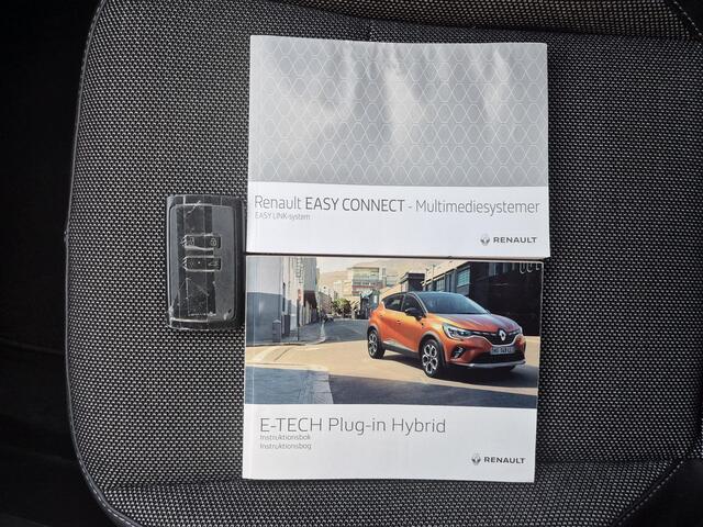 Renault CAPTUR 1.6 E-Tech Plug-in Hybrid 160 Intens Automaat / Pack parking / Stuur en Stoel verwarming / Apple Carplay Android Auto / Achteruitrijcamera / Keyless Entry/Start / Draadloze telefoon lader / Cruise control / Navigatie /