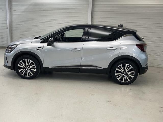 Renault CAPTUR 1.6 E-Tech Hybrid 145 Initiale Paris / Automaat / BOSE Audio / Lederen bekleding / stoel verwarming / dealer onderhouden