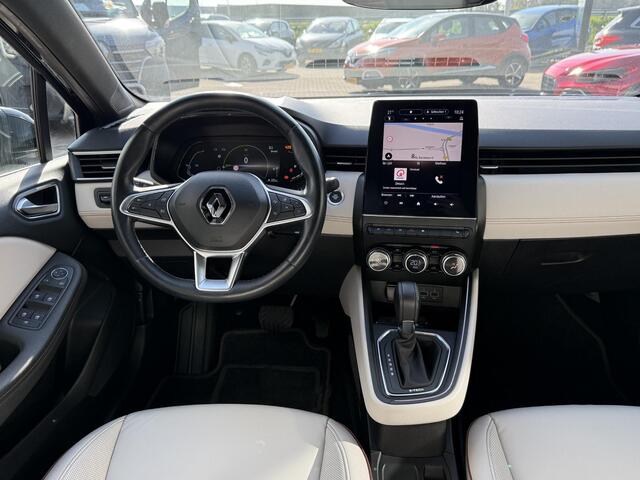 Renault CLIO 1.6 E-Tech Hybrid 140 Initiale Paris | NAP | Stoel & stuur verwarming | Leer | Navigatie | Achteruitrijcamera | Lichtmetaal | Climate Control | LED | DAB |