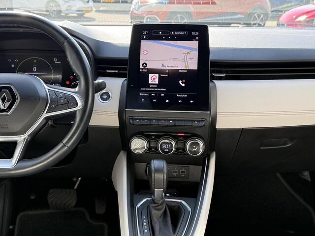 Renault CLIO 1.6 E-Tech Hybrid 140 Initiale Paris | NAP | Stoel & stuur verwarming | Leer | Navigatie | Achteruitrijcamera | Lichtmetaal | Climate Control | LED | DAB |