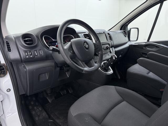 Renault TRAFIC 2.0 dCi 120 T29 L2H1 Dubbele Cabine Trekhaak Camera Navi Ecc Cruise Control Pdc DAB Business Euro 6 Betonplex Vloer Wandbetimmering Regen-Lichtsensor 2.000kg Trekgewicht 1e Eigenaar 5-Persoons