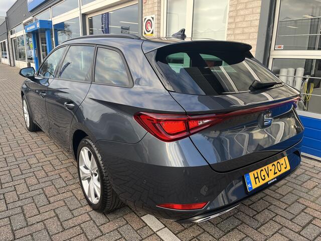Seat LEON Sportstourer 1.5 TSI e-Hybrid FR Business / AUTOMAAT/ FABRIEKSGARANTIE TM 03-2029/ MATRIX/ TRAVEL ASSIST/ STUURVERWARM./ PARK.SENSOR.V+A/ CAMERA/ FULL LINK/ ACC/ NAVI/ RIJ-MODI/ CLIMA/ DAB/ DIGITAL DASH/ LANE-ASSIST/ ISOFIX/ 17'' LMV