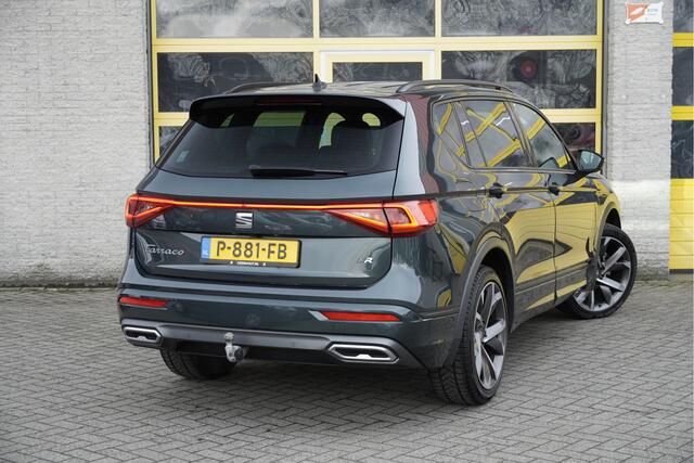 Seat Tarraco 1.5 TSI 150PK! FR Business Intense BJ2022 Lmv 20" | Led V+A | Pdc | Navi | Keyless entry | Elek. trekhaak/achterklep | 360° Camera | App-Connect | Dashboard verlichting | Virtual cockpit | Sportstoelen | Verwarmde voorstoelen/achterbank | Zwarte hemel
