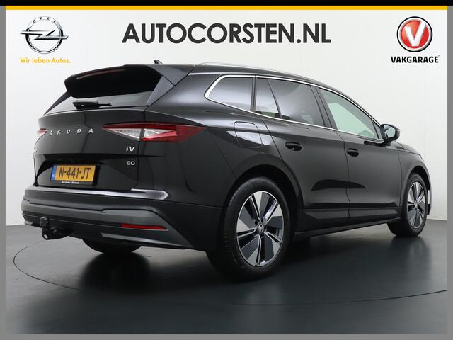 Skoda Enyaq iV 60 180pk Trekhaak Apple Carplay Android Adap.Cruise Camera Navi Led-Matrix Lmv 19" PDC- 3-zone-Ecc Stoel+Bank-Verwarmd Keyless Stuurverwarming Voorruitverwarming Privacy Glas Rijstrooksensor met correctie 1e Eigenaar Nieuwprijs ¤48.865,- Trekgewicht 1.000
