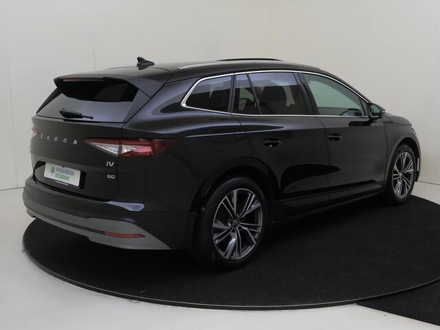 Skoda Enyaq iV 80 Business Edition Plus | Panoramadak | Trekhaak | Keyless | Warmtepomp | Adaptieve cruise control | Dodehoek detectie | Parkeerasisstent |