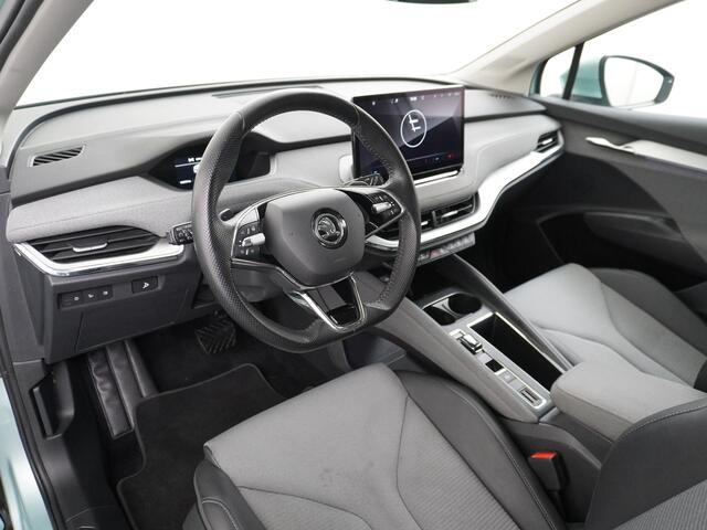 Skoda Enyaq iV 60 180PK Apple Carplay Android NaviCamera 20" Matrix-Led Pdc-a+v Ecc Lmv Parkeerpakket Stoel+Stuurverwarming Comfortpakket Sportpakket Lichtpakket Dab Keyless advanced Bluetooth Cruise ControlRijstrooksensor Connected services Privacy Glas 1e Eigenaar Nie
