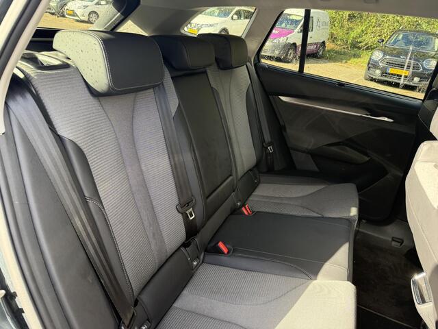 Skoda Enyaq iV 80 (204PK) ACCU 93%! BEREIK 537KM GARANTIE 4-2031 . NAVIGATIE . STUURWIEL VERWARMD . PARKEERSENSOREN VOOR & ACHTER .